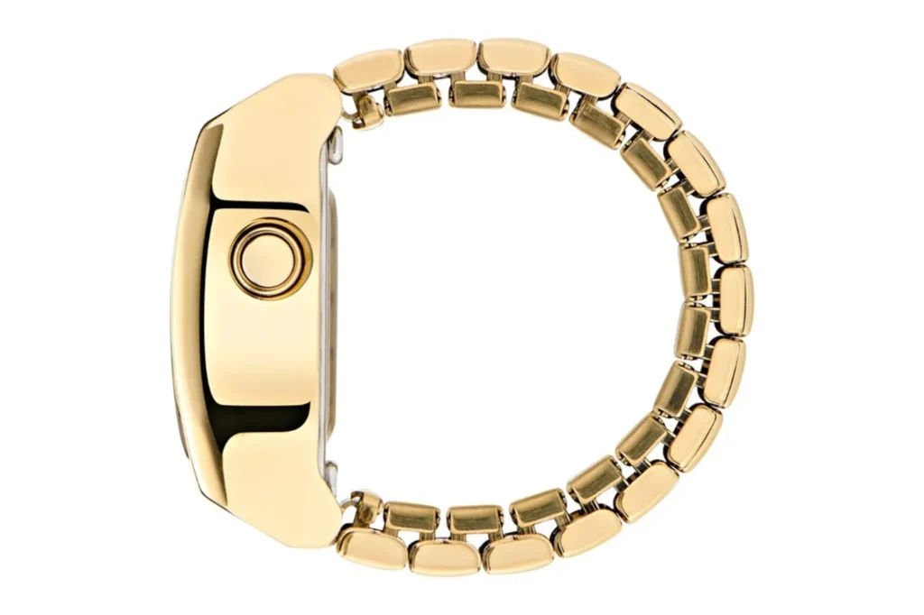 Side profile of a gold-tone adidas Digital Two ring showing the case pusher and link-style expansion band.