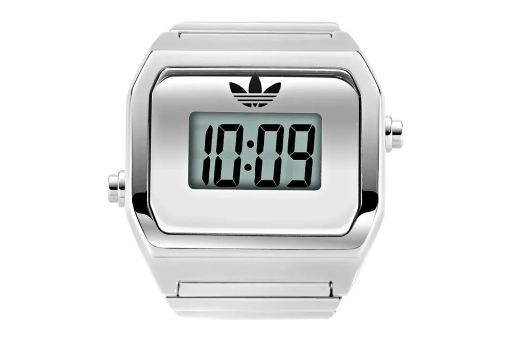 Front view of a silver-tone adidas Digital Two ring watch with digital display showing 10:09 on white background.
