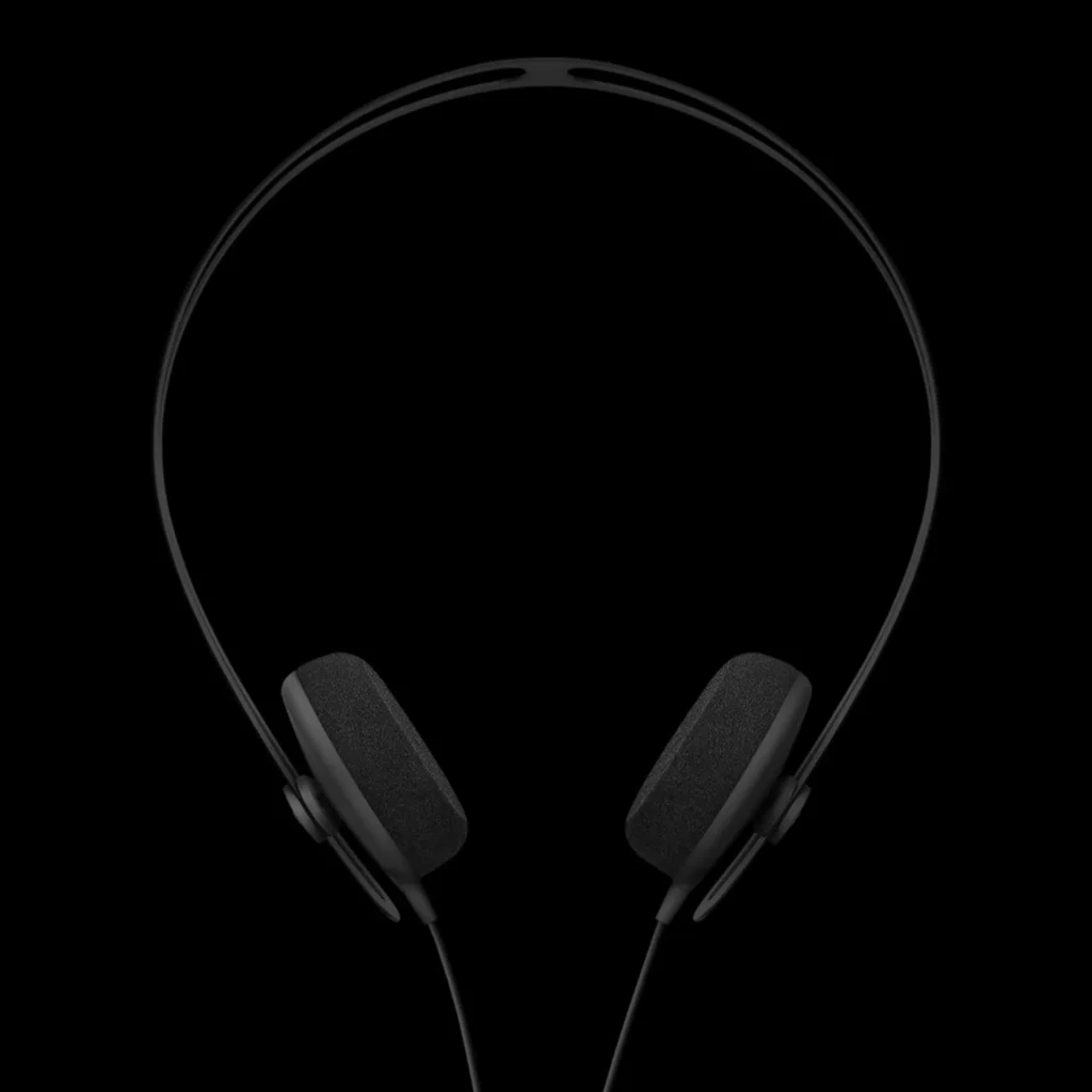 AIAIAI Tracks on-ear headphones all-black stealth design with thin circular headband and rounded rectangular pads on black b…