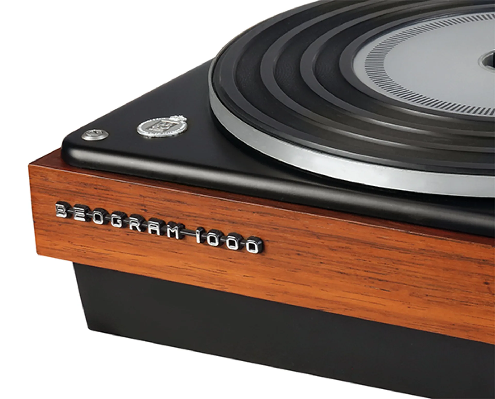 Vintage Bang Olufsen Beogram 1000 turntable three-quarter view, wood plinth, matte black top, silver platter and tonearm, BE…