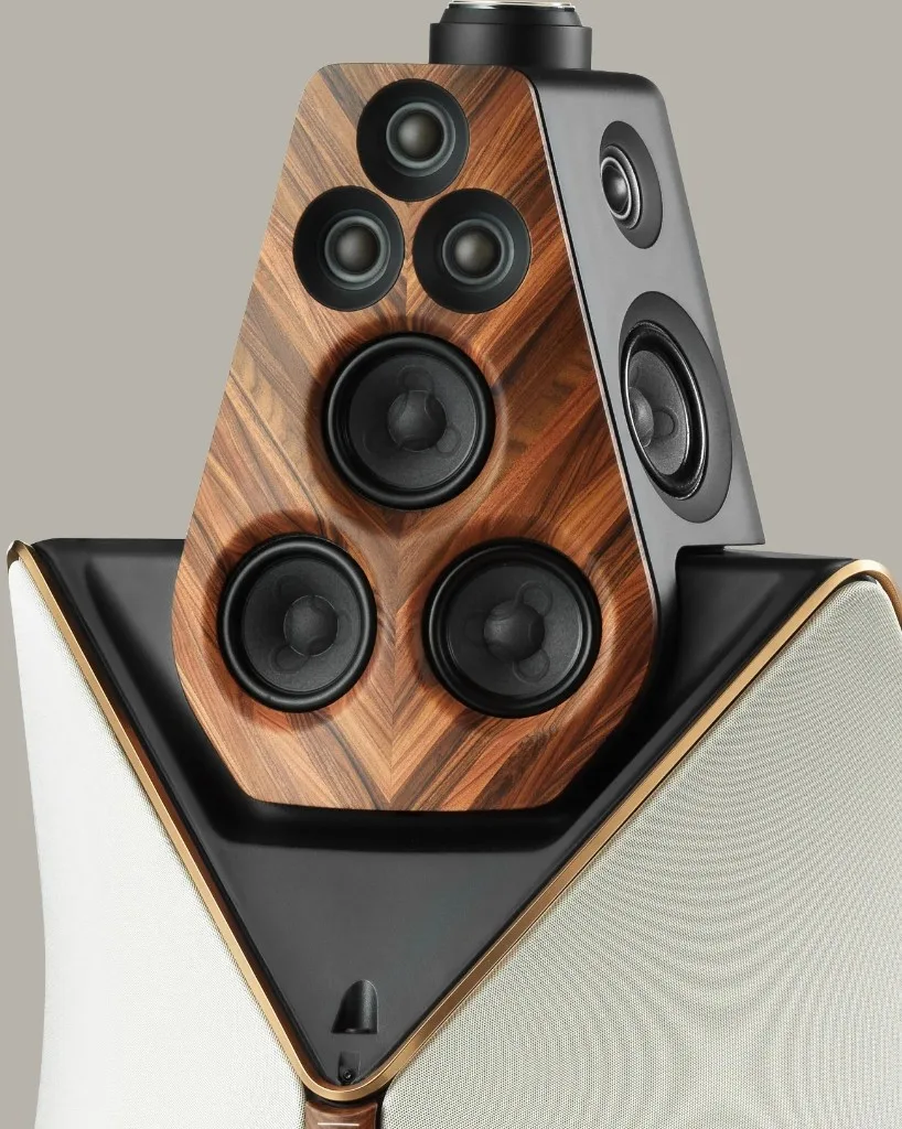 Close-up of Bang Olufsen Beolab 90 Monarch Edition faceted wood panels and multi-driver array.