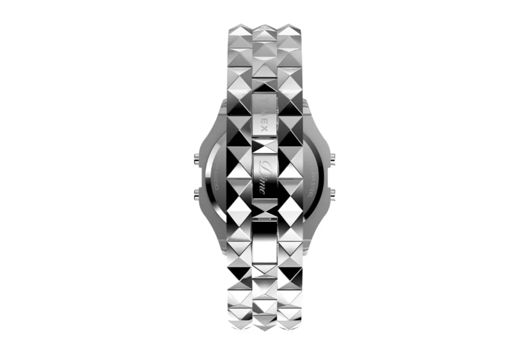 Dime x Timex T80 collaboration watch rear view: brushed case back with Dime script and Timex engravings, three-row pyramid s…