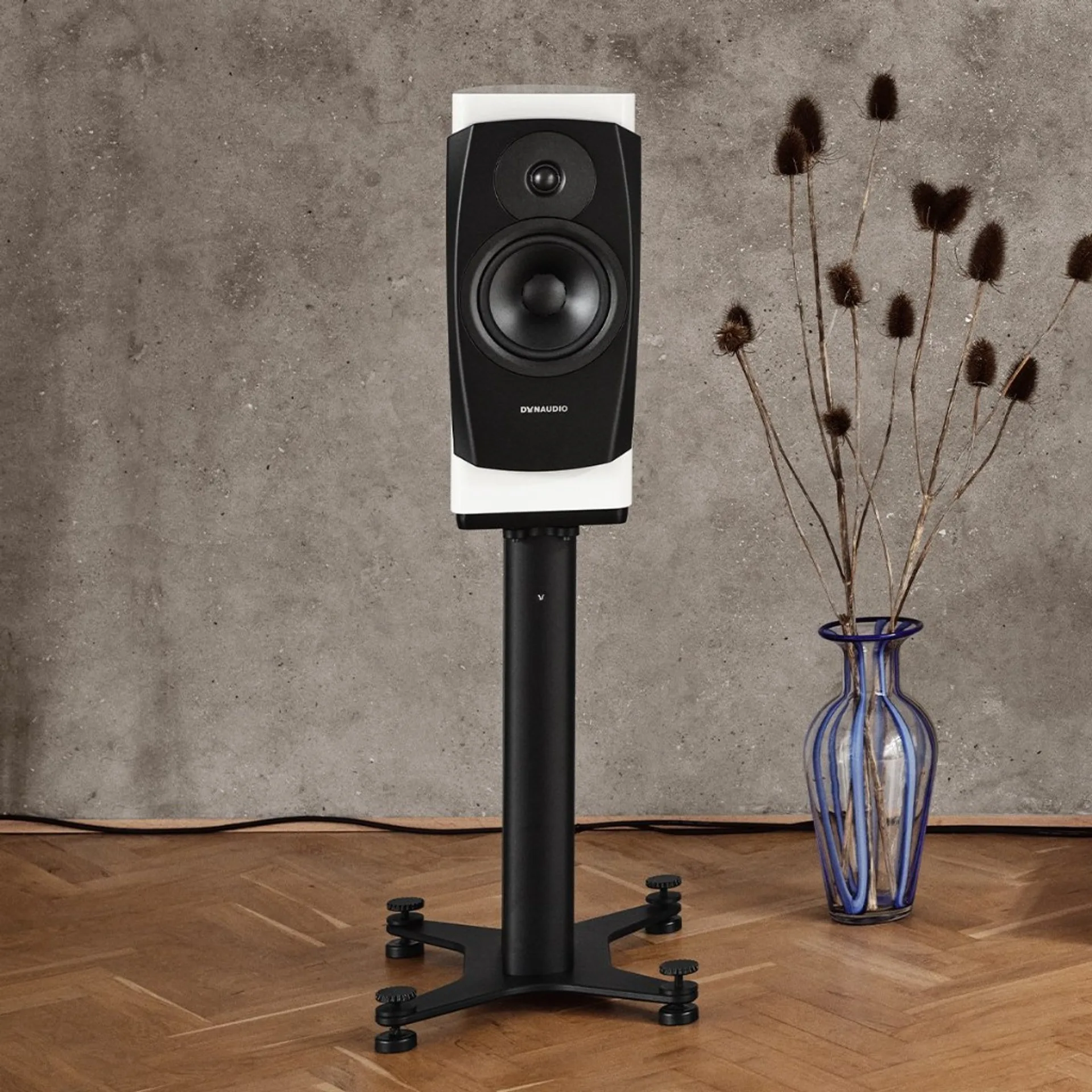 Dynaudio Confidence 20A in snow finish on stand, front-facing product view.
