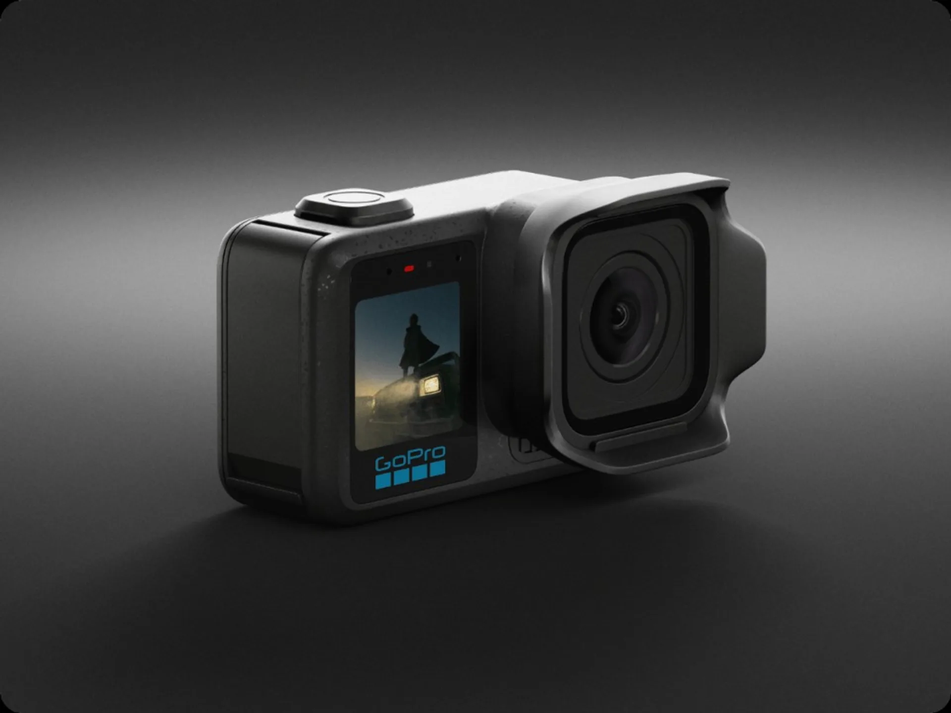 GoPro Mission 1 preorder product shot: rugged black body, hooded lens, front color display with desert sunset preview, red s…