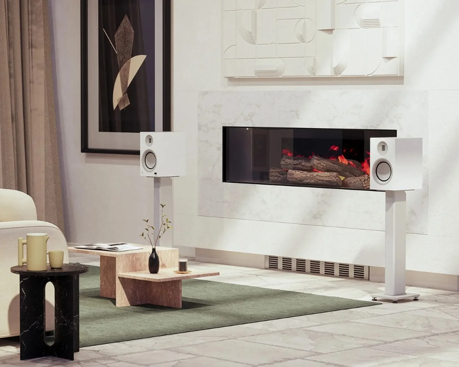 Pair of matte white Kanto TUK speakers on matching stands flanking a marble electric fireplace in a modern living room.