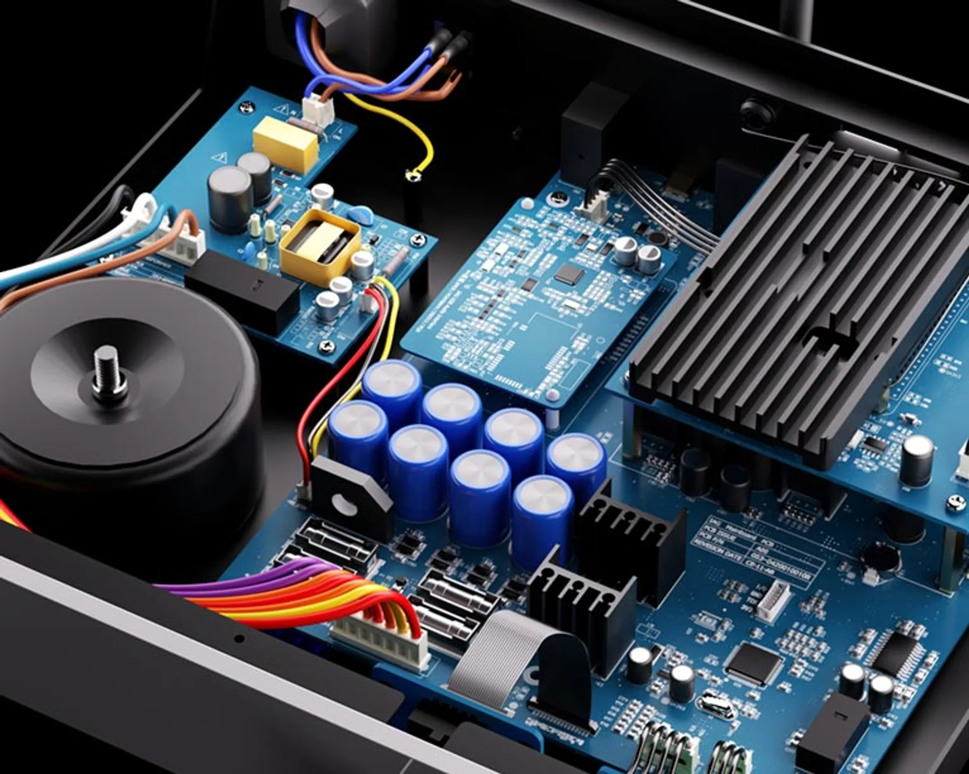 Internal view of Leak TruStream electronics: blue PCBs, toroidal transformer, filter capacitors, heatsinks, and IAG mainboar…