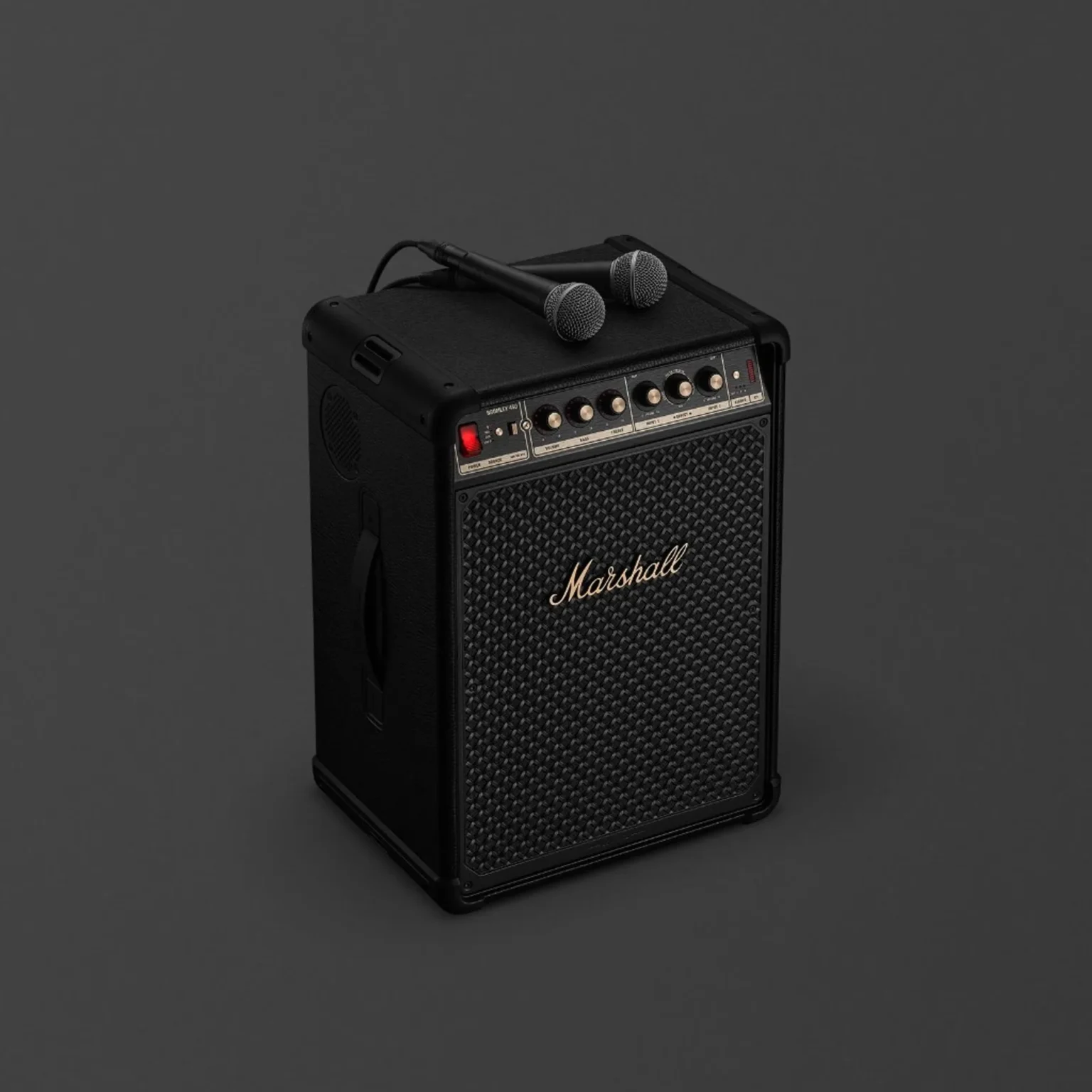 Marshall Bromley 450 party speaker with two wired microphones on top, black tolex, gold control panel and script logo on gri…
