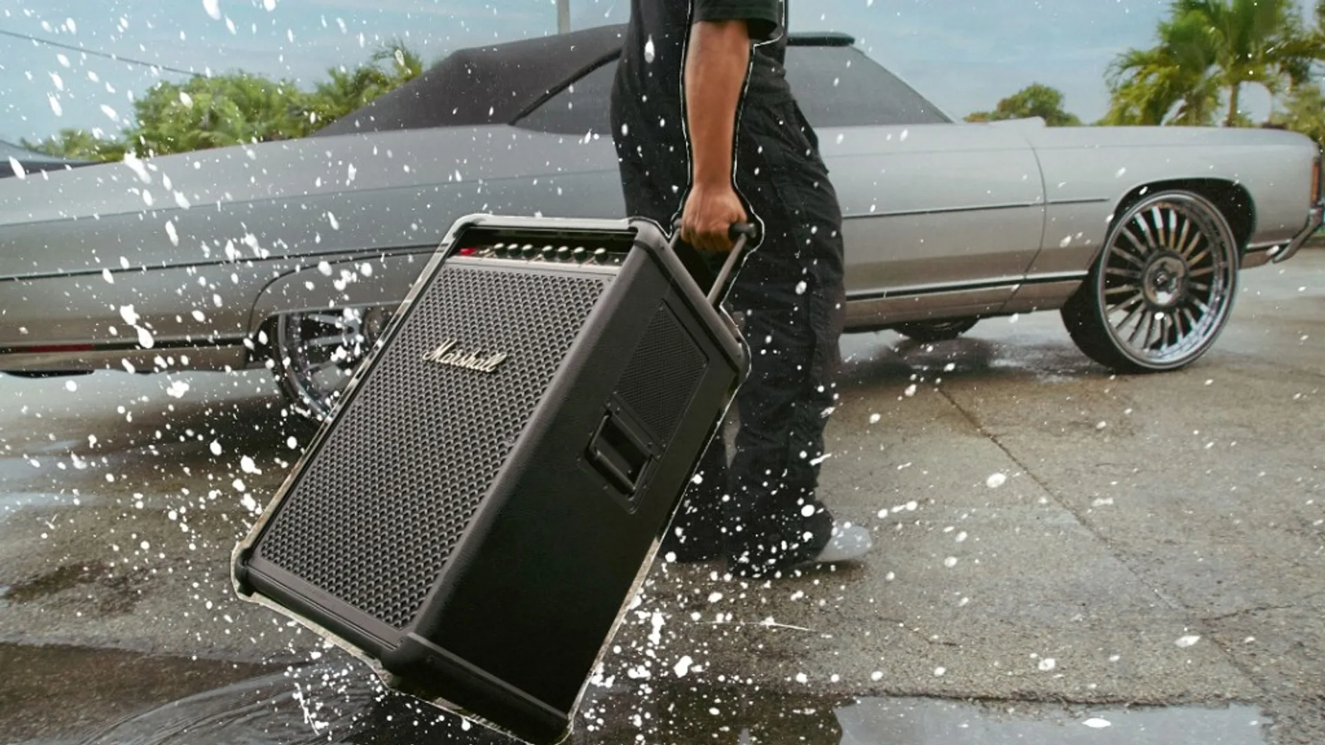 Marshall Bromley 750 portable speaker product hero shot for desktop web layouts, dark premium styling.