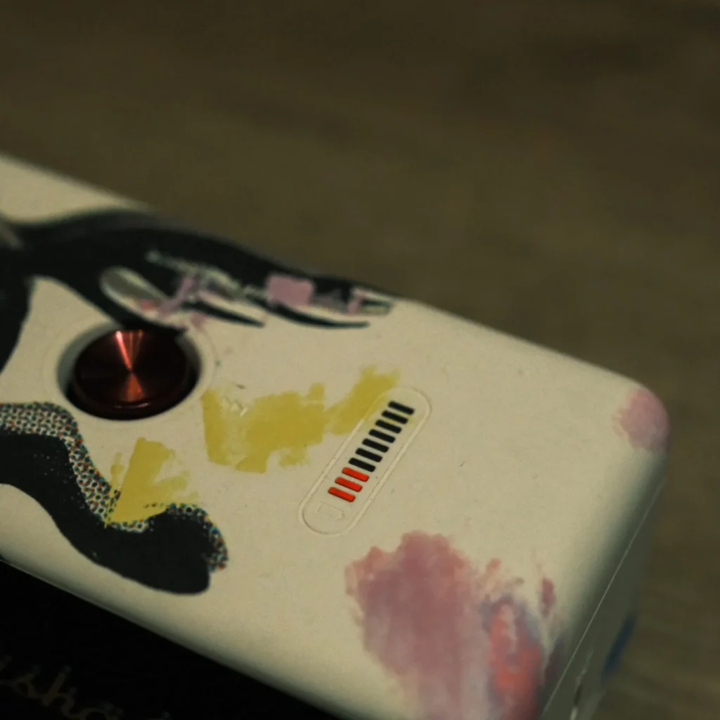 Marshall Emberton III Lunar New Year 2026: close-up of top panel with red control knob and battery indicator on special-edition artwork.