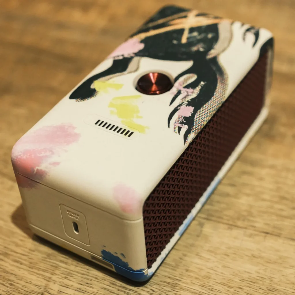 Marshall Emberton III Lunar New Year 2026 angled view: USB-C power input, red control, slatted vent, and limited top artwork.