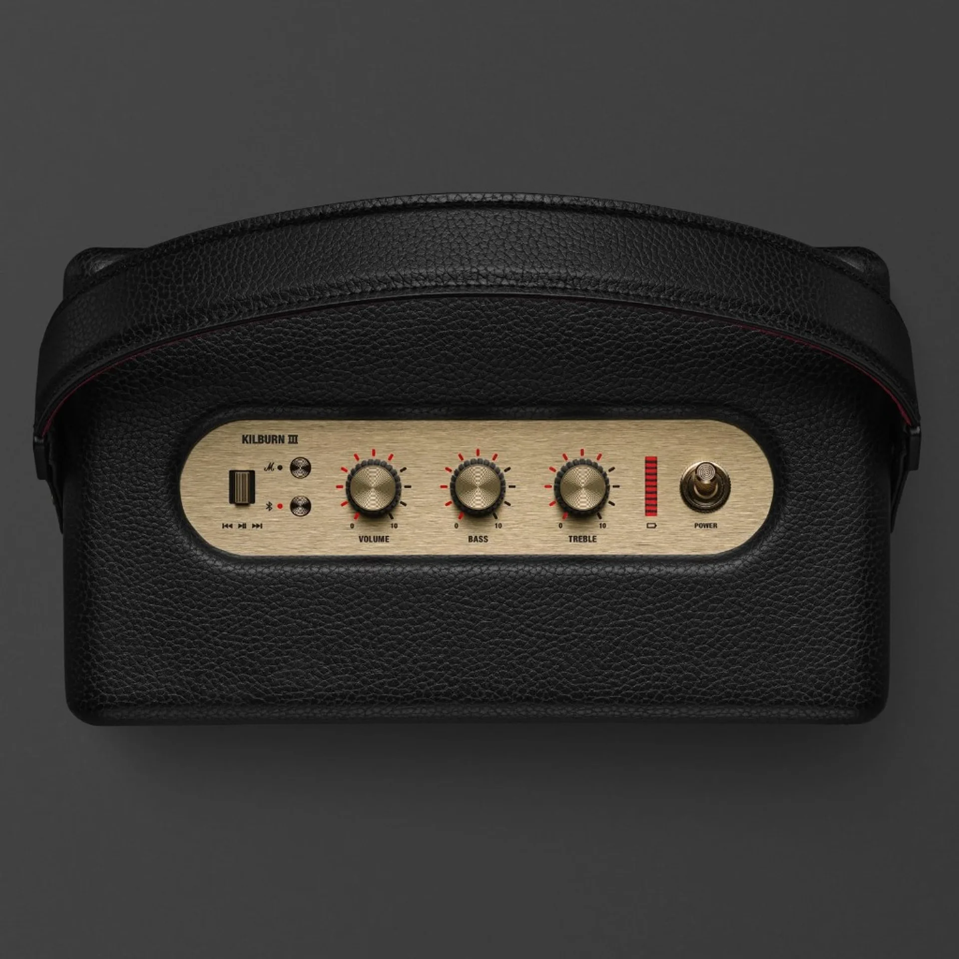 Marshall Kilburn III top view: brass panel with KILBURN III label, playback joystick, Bluetooth, Volume Bass Treble knobs 0-…