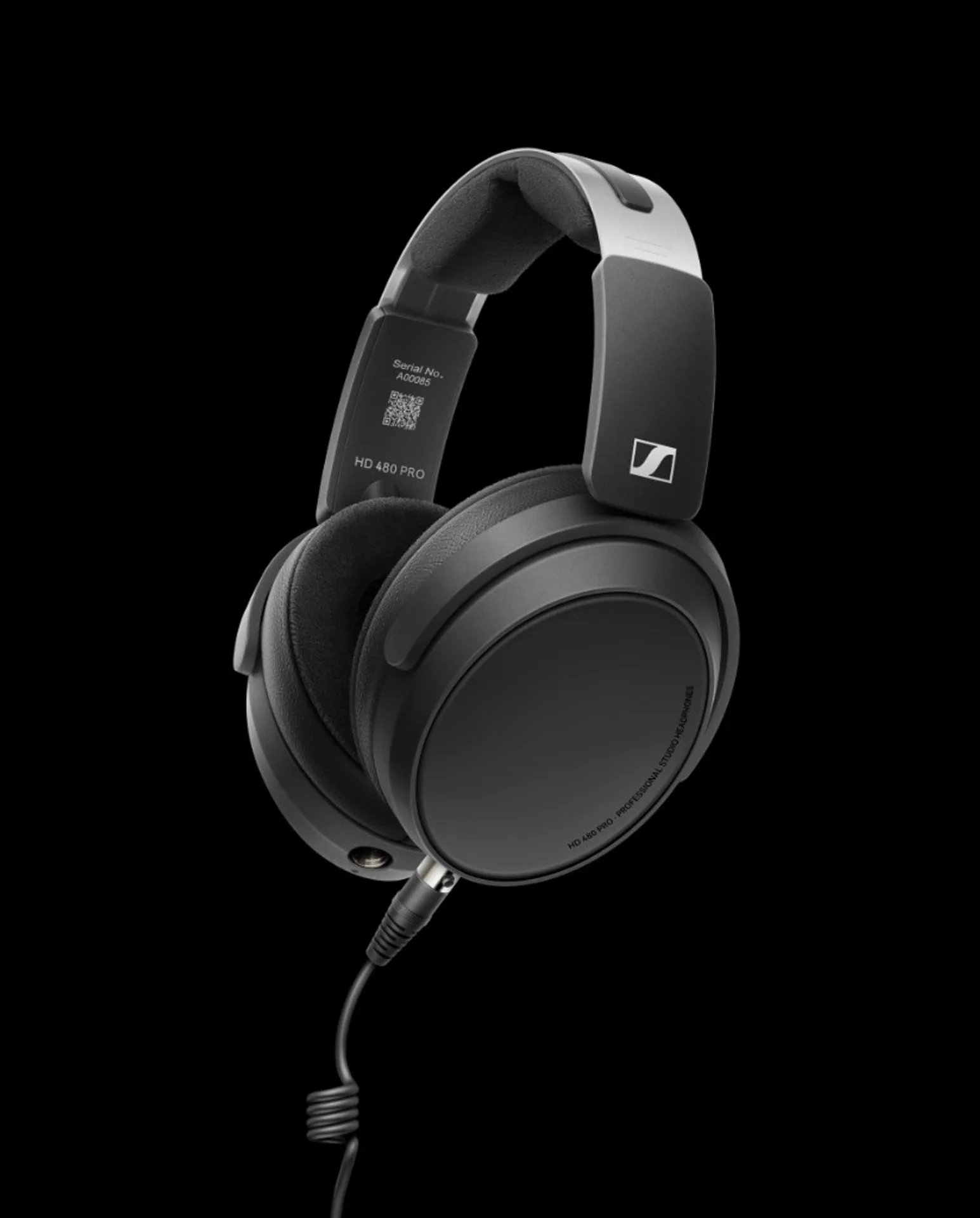 Sennheiser HD 480 PRO closed-back headphones three-quarter view: padded headband, HD 480 PRO lettering, coiled cable on black.