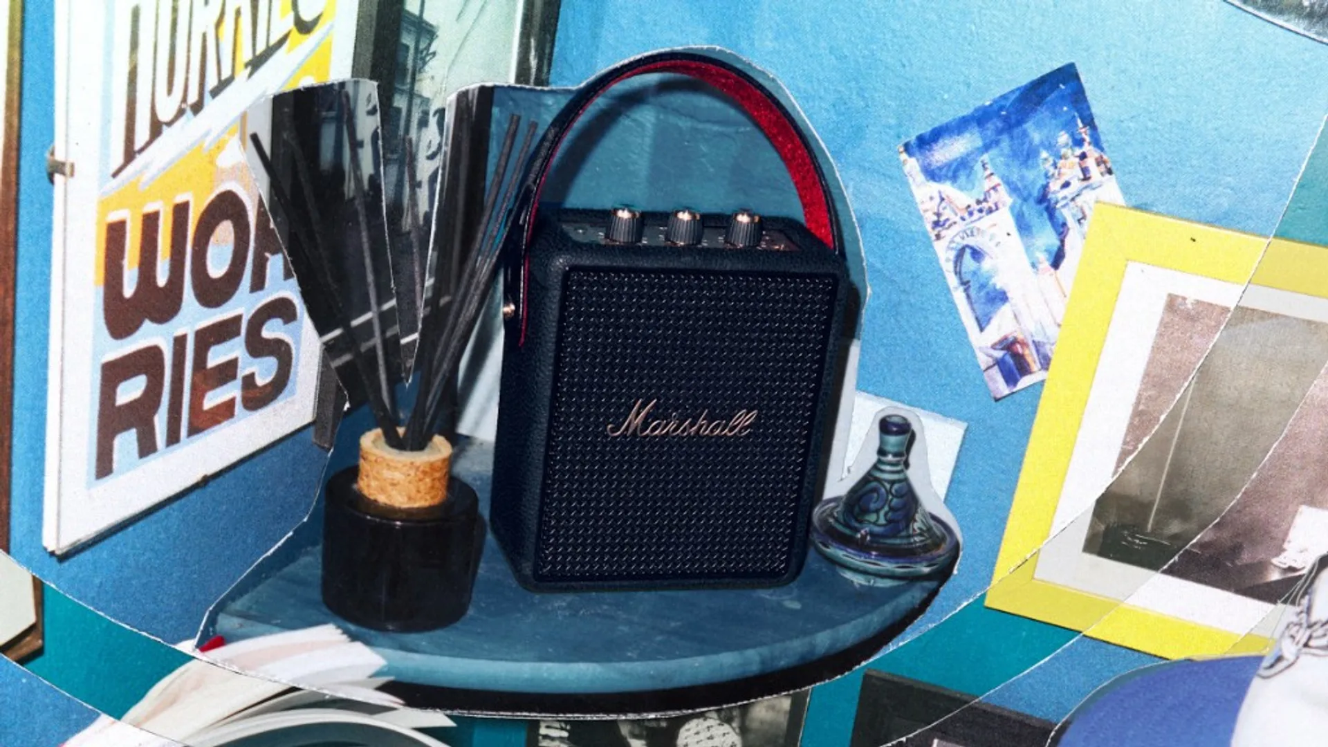 Marshall Stockwell III Black and Brass on a blue shelf in a collage-style lifestyle interior with decor objects.