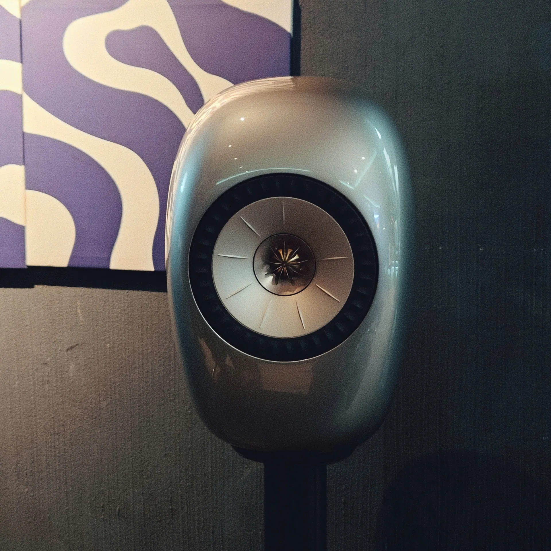 KEF LS LUXE Dusk Titanium on floor stand with Uni-Q driver against gallery wall