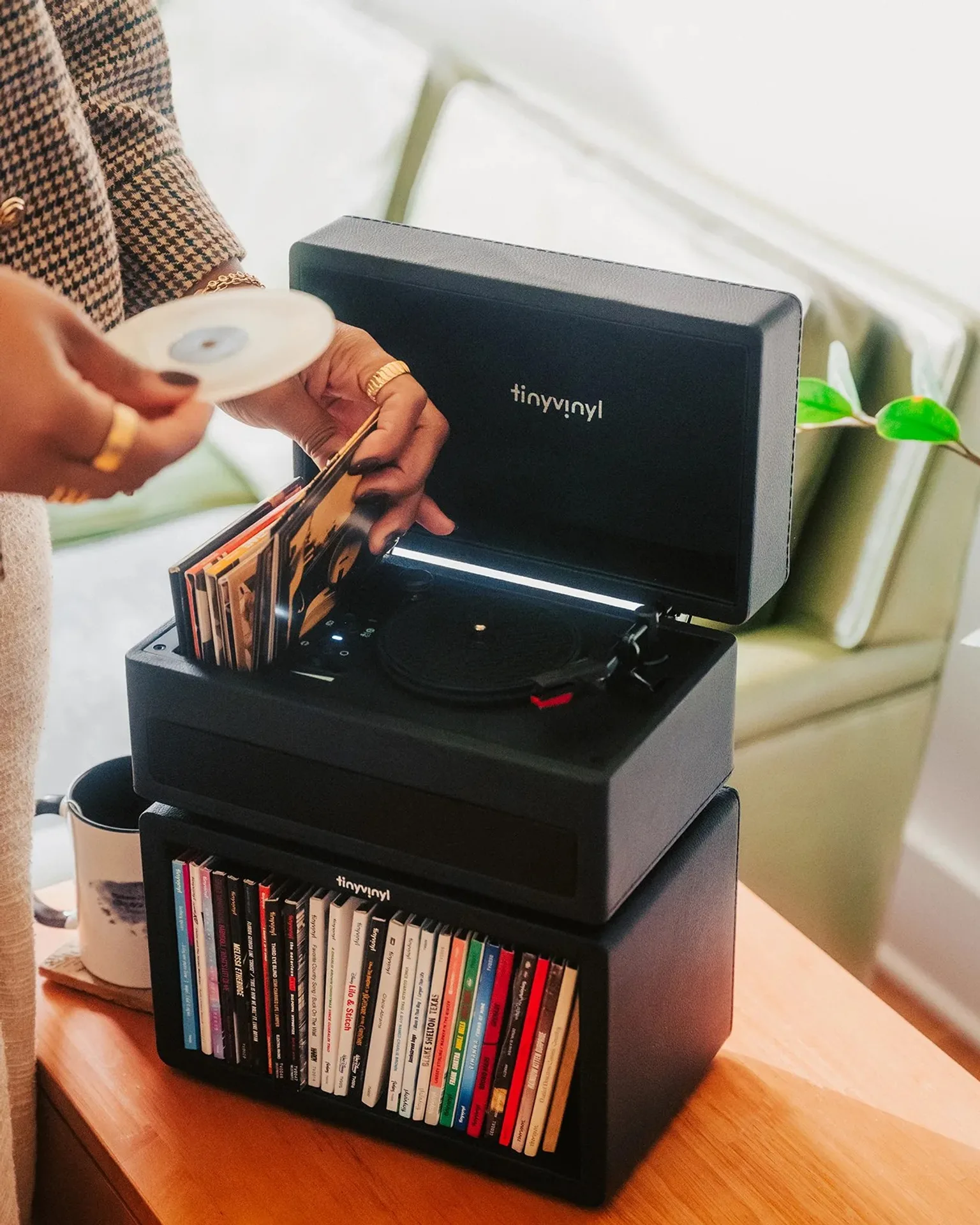 Tiny Vinyl Player open showing platter tonearm and built-in speakers